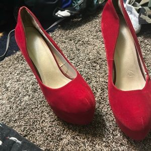 I am selling size 11 platform, red and gold platform heels